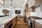 Enjoy the stainless steel appliances in the kitchen